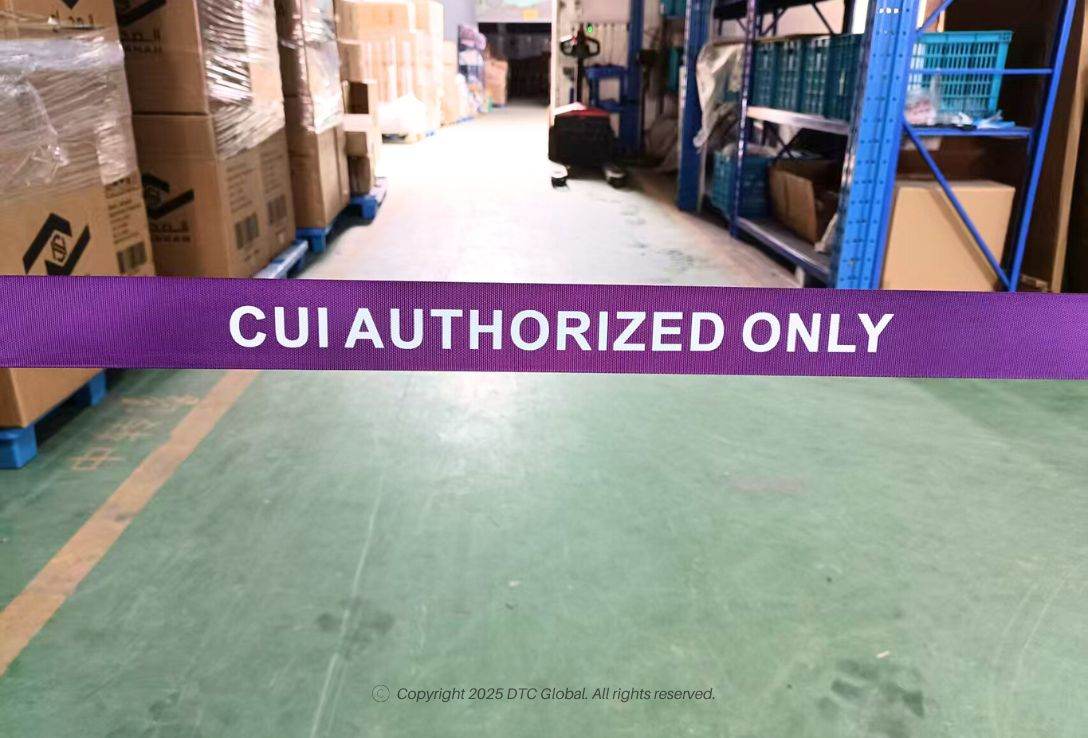 Purple retractable belt barrier with "CUI AUTHORIZED ONLY" text for controlled access in industrial storage area