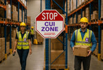 CUI Zone Stop Sign in warehouse with workers wearing yellow safety helmets and vests carrying boxes. CUI Zone Stop Signs